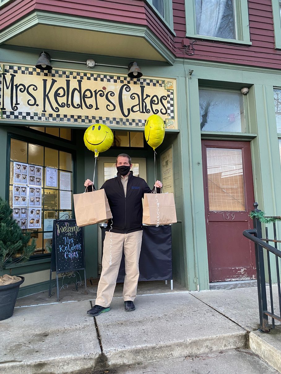 Outside the first shop with bags ready for curbside pickup