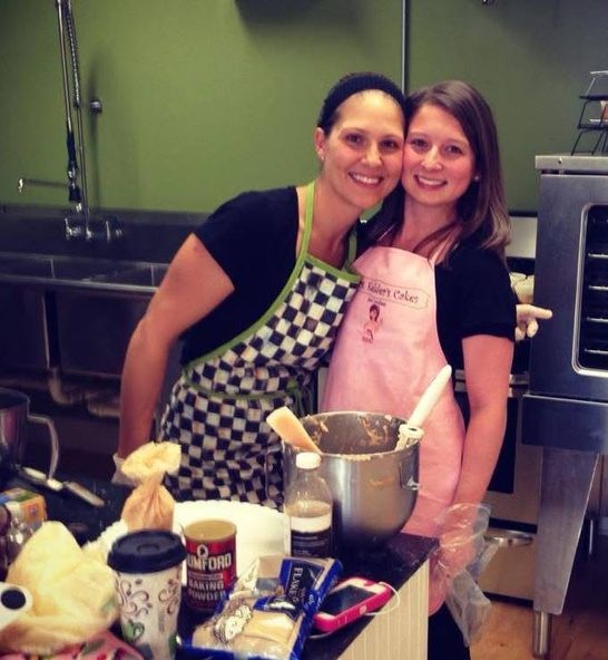 Mrs. Kelder and a friend in aprons in the shop kitchen